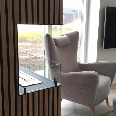 Foco Corner Left 1000 - Modern corner bioethanol fireplace with a sleek black frame and vibrant flames.