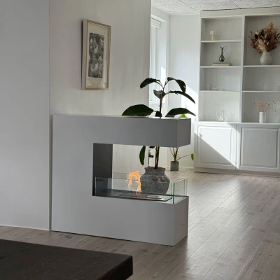 Grand, white freestanding fireplace with glass panels Three-sided freestanding bio ethanol fireplace in white
