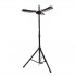 Black electric patio heater mounted on a parasol