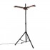 Black electric patio heater mounted on a parasol