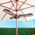 Black electric patio heater mounted on a parasol
